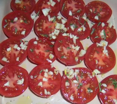 Tomatoes prepped for oven roasting